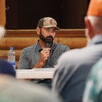 Assistant Superintendent Philip Beamer, with the State Engineer's Office, addresses a crowd at Shell Community Hall last Tuesday evening. Lisa Kunkel