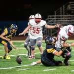 Greybull Buff Will Harlow (5) takes down a Big Piney Puncher, creating an opening for Carter Peasley, far left, to make a fumble recovery at Friday night’s home game. Avery howe