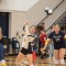 Joey Boyer, left, pops a free ball over the net for the Buffs while teammate Josie Collingwood covers her in a JV match Friday. Avery Howe