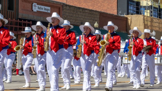 Liam Wisehart, third from left, marches in Cody's Fourth of July parade with the All-State marching band. Photo Courtesy of Darcie Wisehart