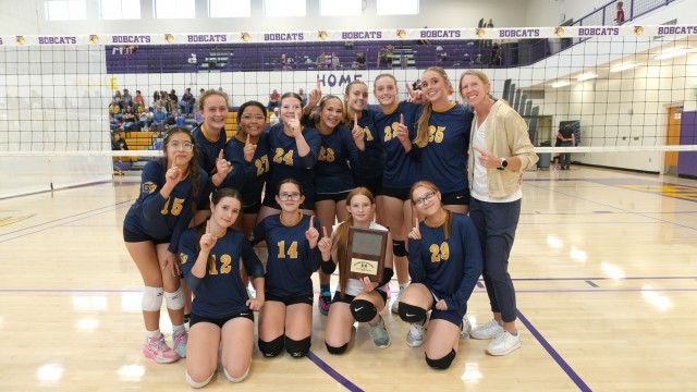 The GMS A team celebrates their conference championship in Thermopolis on Saturday. Front row left to right, Haven Wiggins, Aliina Averett, Paisley Link and Lacy Winkler; back row left to right, Christina Lopez, Joslyn Hunt, Darleh Jara Rios, Peytin Cervantes, Ruby Dalin, Norah Thur, Emily and Audrey Didrickson, and Coach Becky Eichelberger. Photo courtesy of Paul Thur